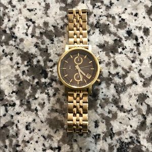 Gold fossil watch